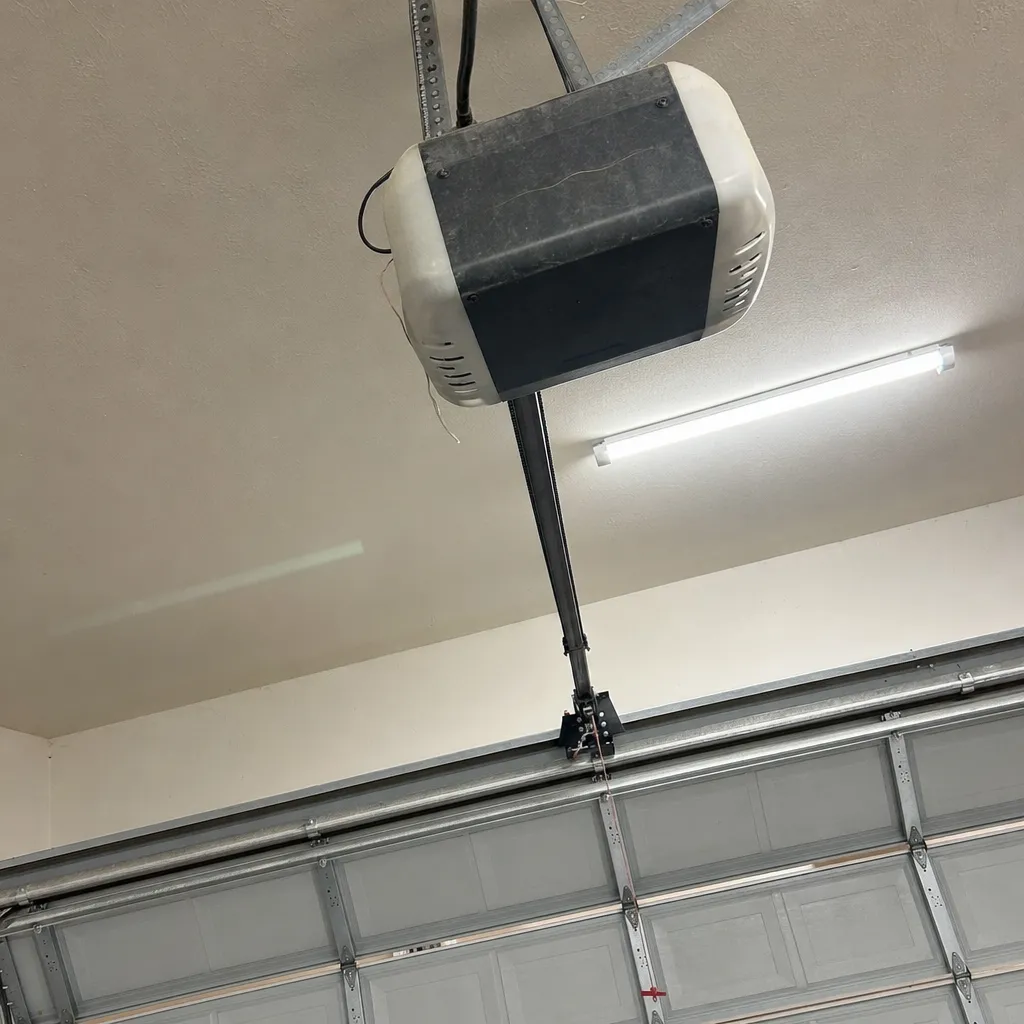 Ceiling-mounted garage door opener documented on-site before diagnosis in Southlake TX